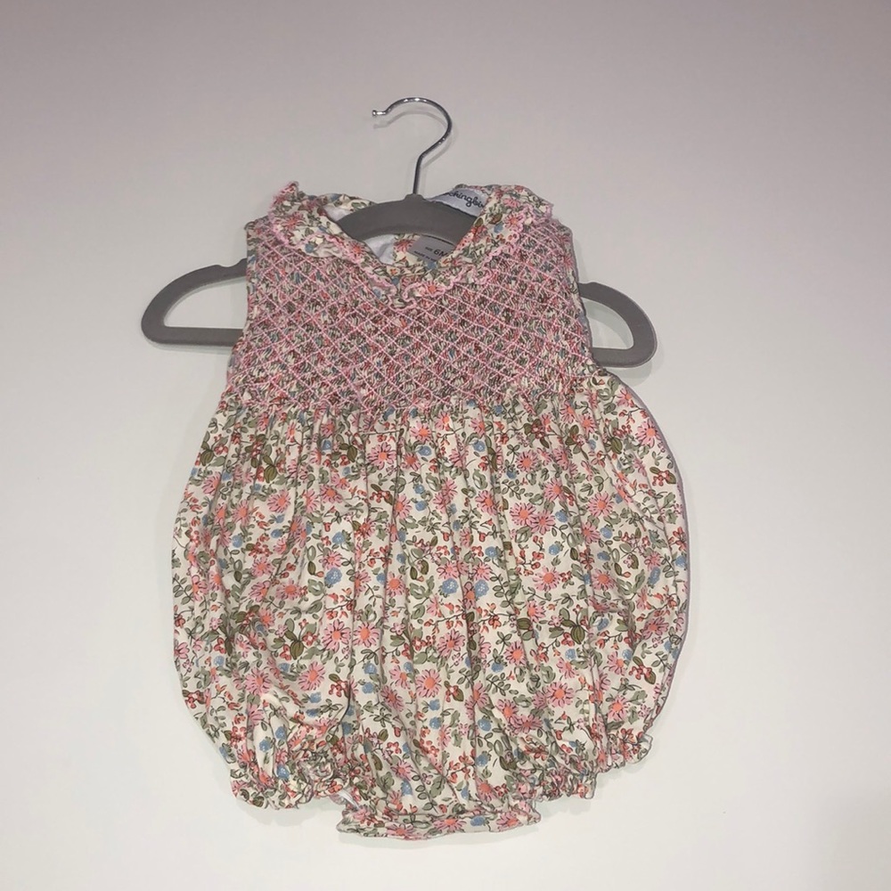 Smockingbird floral onesie